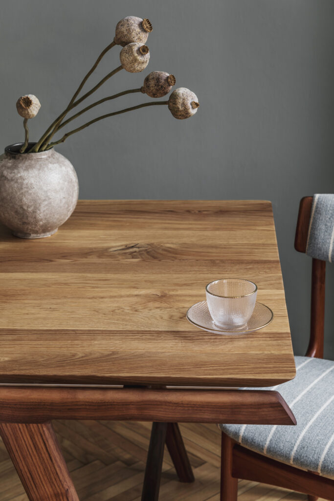 Stylish and modern dining room interior with design sharing tabl